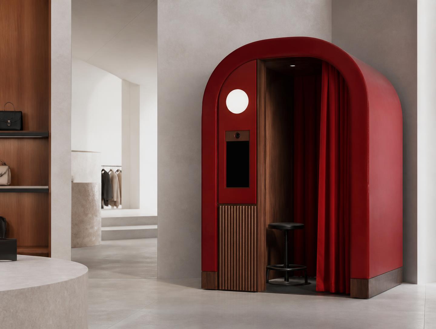 Bespoke arched red photobooth installed in a retail flagship